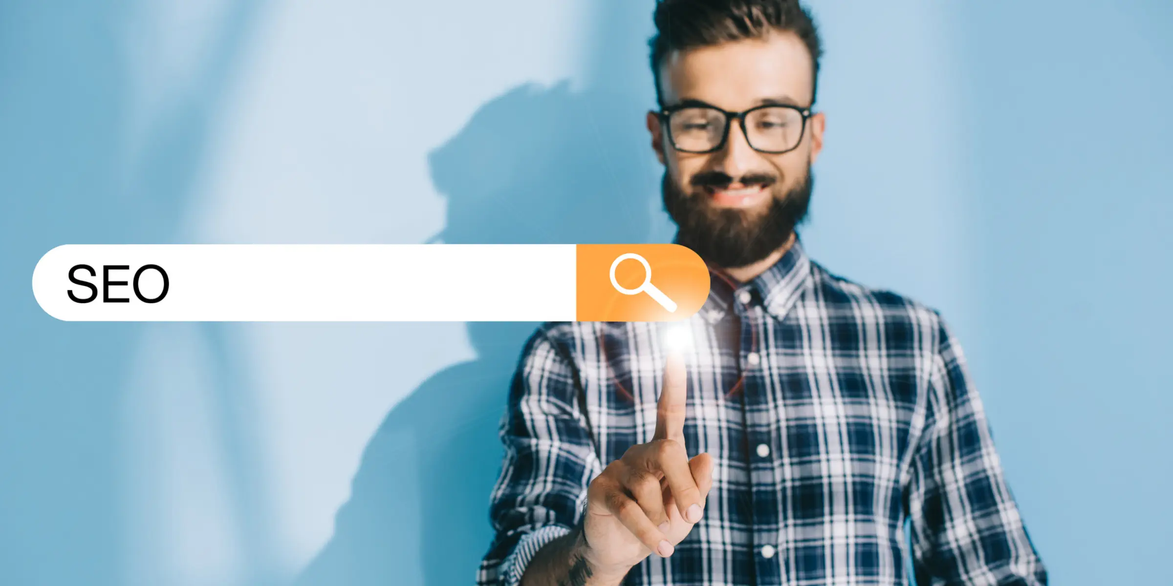A man is pointing at the word seo.